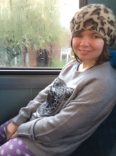 Ellen on the bus in her new jumper